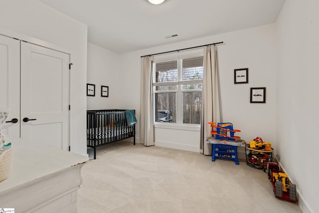 12 Beech Creek Ct, Greer, SC 29651 - bedroom featuring light carpet and a crib