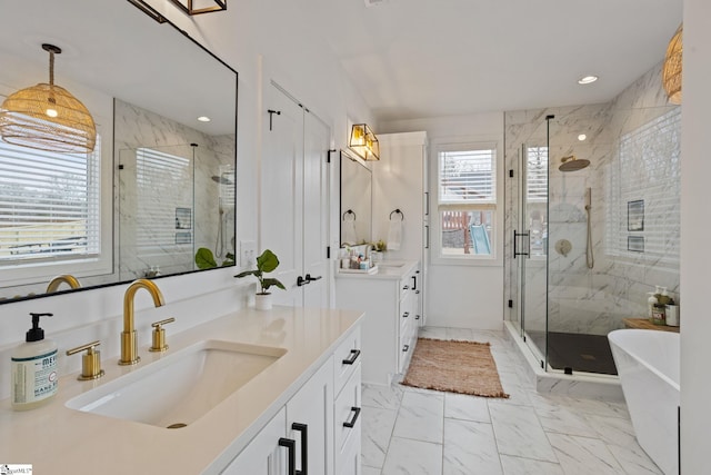 12 Beech Creek Ct, Greer, SC 29651 - full bath featuring vanity, a marble finish shower, marble look tile flooring, a freestanding tub, and recessed lighting