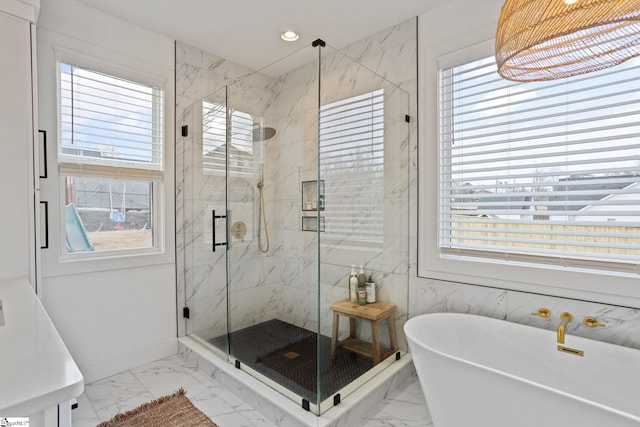 12 Beech Creek Ct, Greer, SC 29651 - full bathroom featuring marble finish flooring, a freestanding tub, a marble finish shower, and recessed lighting
