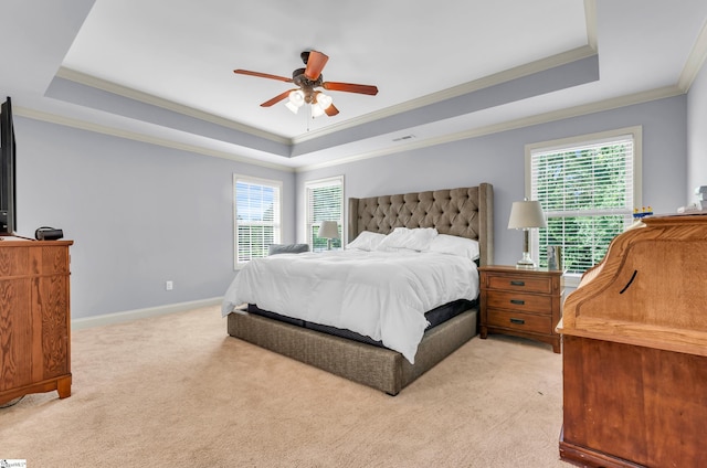 911 Devenger Rd, Greer, SC 29650 - bedroom with a tray ceiling, ornamental molding, light colored carpet, and ceiling fan