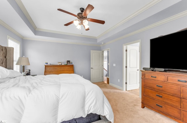 911 Devenger Rd, Greer, SC 29650 - bedroom with light colored carpet, a tray ceiling, crown molding, and a ceiling fan