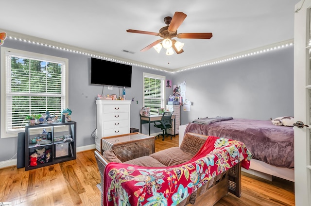 911 Devenger Rd, Greer, SC 29650 - bedroom with wood finished floors and a ceiling fan