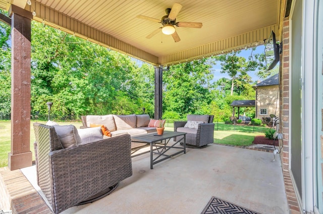 911 Devenger Rd, Greer, SC 29650 - view of patio with outdoor lounge area, ceiling fan, and view of scattered trees