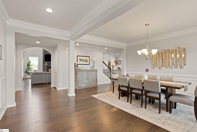430 Cloverland Ln, Duncan, SC 29334 - dining space with crown molding, wood finished floors, arched walkways, a chandelier, and recessed lighting