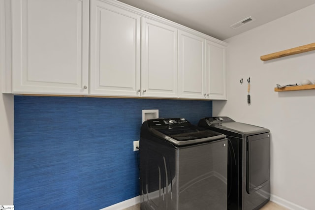 430 Cloverland Ln, Duncan, SC 29334 - washroom featuring cabinet space and washing machine and dryer