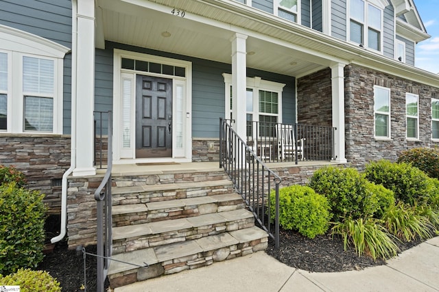 430 Cloverland Ln, Duncan, SC 29334 - property entrance with covered porch and stone siding