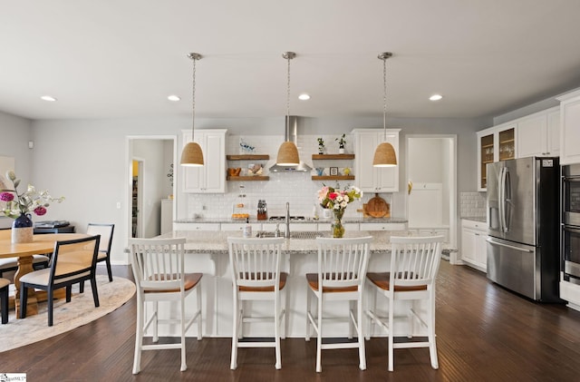 430 Cloverland Ln, Duncan, SC 29334 - kitchen with stainless steel refrigerator with ice dispenser, island range hood, backsplash, white cabinets, and recessed lighting