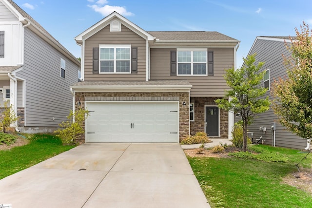 125 Magnolia St, Reidville, SC 29388 - view of front of house with stone siding, an attached garage, driveway, and a front yard