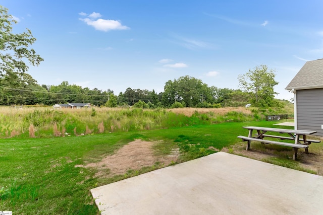 125 Magnolia St, Reidville, SC 29388 - view of grassy yard with a patio area