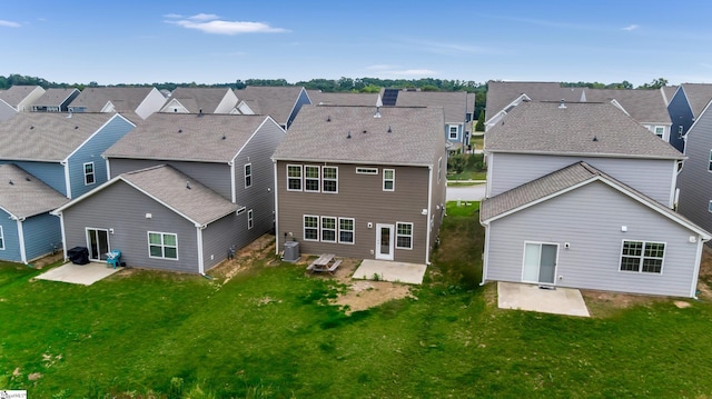 125 Magnolia St, Reidville, SC 29388 - rear view of house with a patio, a residential view, and a yard