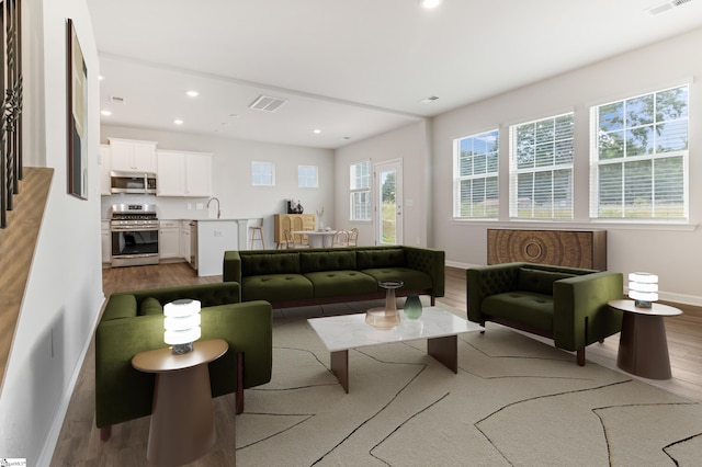 125 Magnolia St, Reidville, SC 29388 - living area with light wood-type flooring and recessed lighting