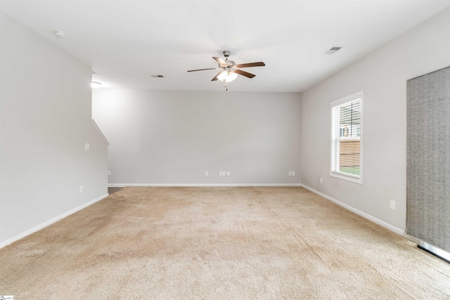 177 Viewmont Dr, Duncan, SC 29334 - spare room featuring ceiling fan, light carpet, and a smoke detector
