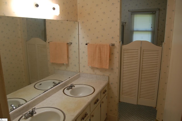 16 Heathwood Cir, Taylors, SC 29687 - full bathroom with wallpapered walls, double vanity, and tile patterned floors