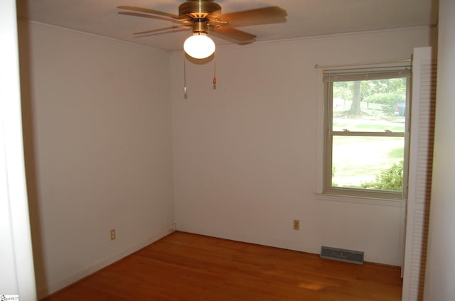 16 Heathwood Cir, Taylors, SC 29687 - empty room featuring ornamental molding, light wood finished floors, and ceiling fan