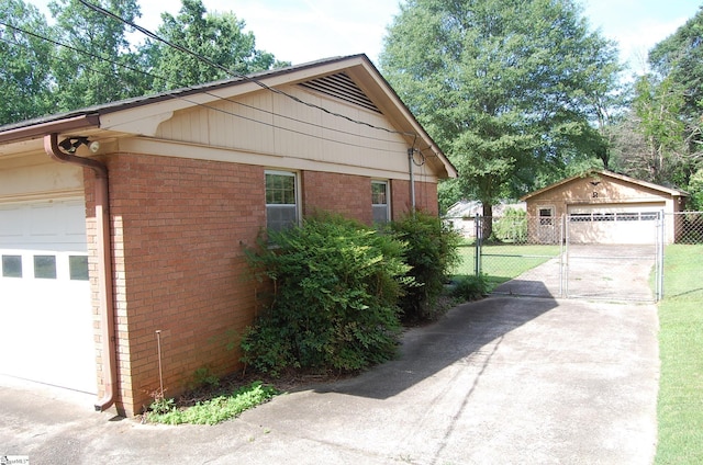 16 Heathwood Cir, Taylors, SC 29687 - view of side of home featuring a garage and brick siding