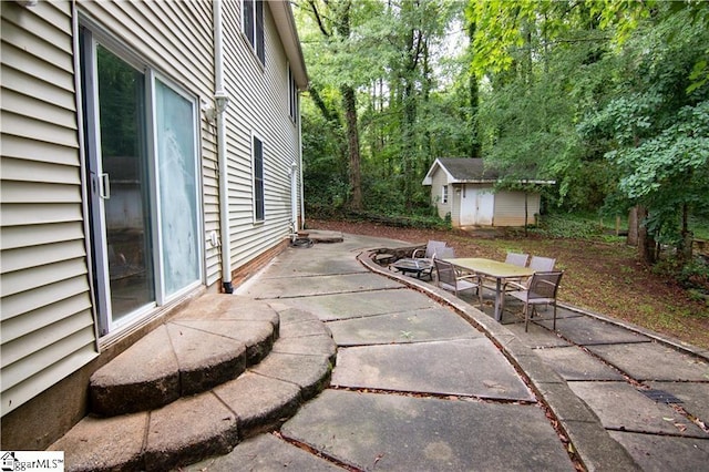 124 Grand Oak Dr, Pendleton, SC 29670 - view of patio / terrace with a shed and outdoor dining area