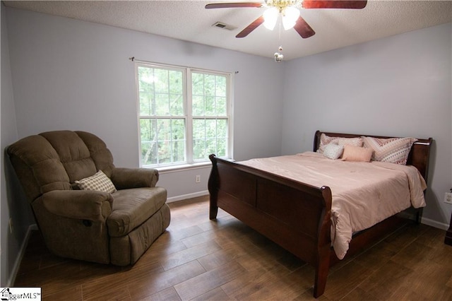 124 Grand Oak Dr, Pendleton, SC 29670 - bedroom featuring wood finished floors, a textured ceiling, and ceiling fan