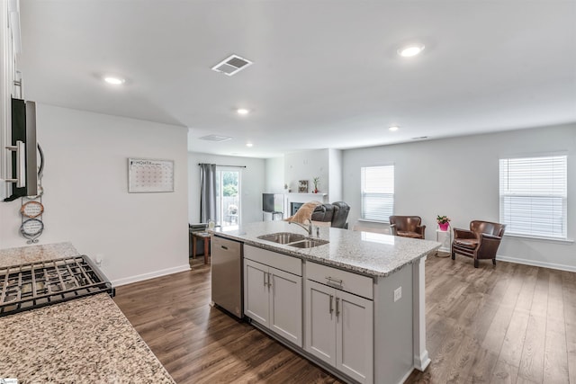 1808 Bridle Ln, Roebuck, SC 29376 - kitchen featuring dishwasher, open floor plan, light stone counters, dark wood-type flooring, and recessed lighting