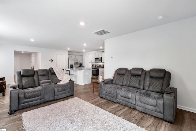 1808 Bridle Ln, Roebuck, SC 29376 - living room featuring recessed lighting and wood finished floors