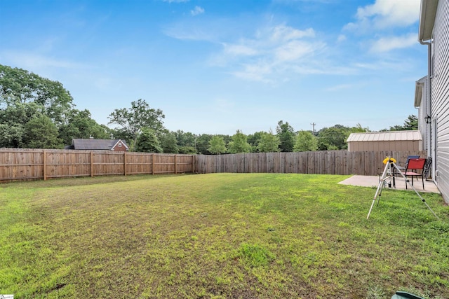 1808 Bridle Ln, Roebuck, SC 29376 - fenced backyard with a patio area