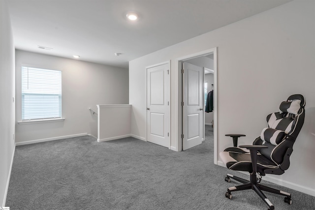 1808 Bridle Ln, Roebuck, SC 29376 - sitting room with baseboards and dark colored carpet