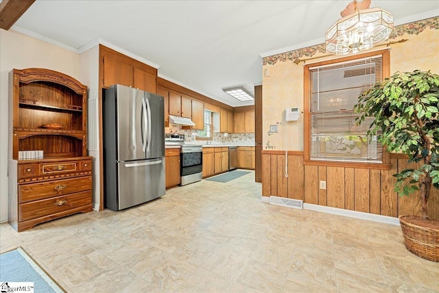 200 Camille St, Easley, SC 29642 - kitchen with appliances with stainless steel finishes, under cabinet range hood, light countertops, brown cabinetry, and a chandelier