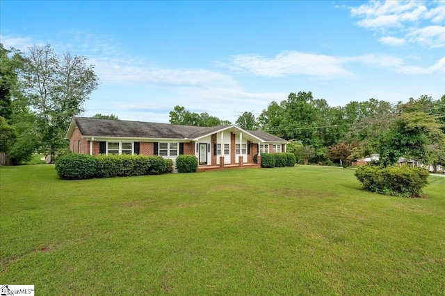200 Camille St, Easley, SC 29642 - ranch-style house featuring a front yard, covered porch, and brick siding