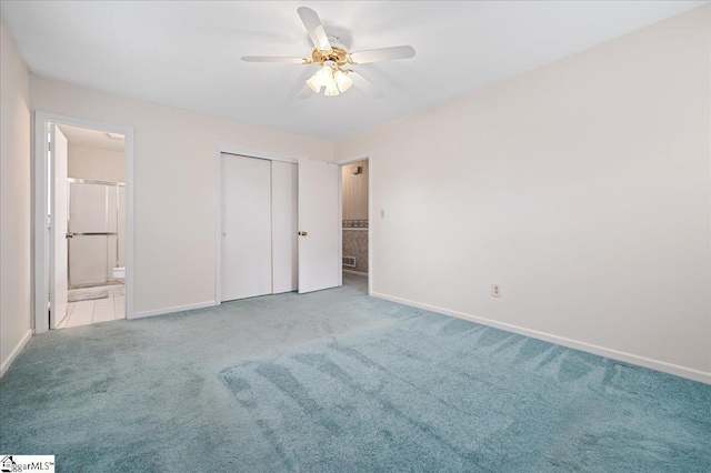 200 Camille St, Easley, SC 29642 - unfurnished bedroom featuring carpet flooring, a closet, connected bathroom, and ceiling fan