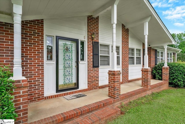 200 Camille St, Easley, SC 29642 - doorway to property with a porch and brick siding