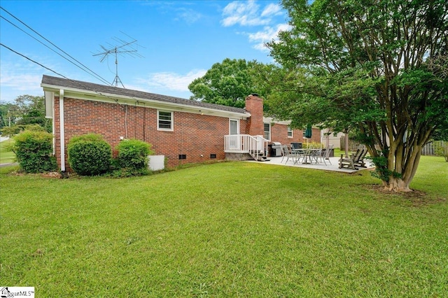 200 Camille St, Easley, SC 29642 - rear view of house featuring a patio area, crawl space, a yard, and brick siding