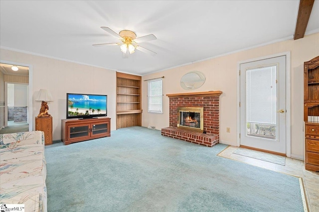 200 Camille St, Easley, SC 29642 - carpeted living room featuring a ceiling fan, crown molding, a brick fireplace, and built in features