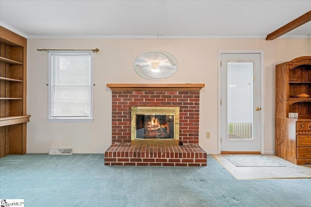 200 Camille St, Easley, SC 29642 - unfurnished living room with carpet floors, a fireplace, and crown molding