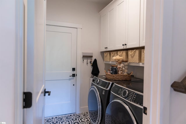 140 Holmes Dr, Spartanburg, SC 29303 - laundry area with cabinet space and washer and clothes dryer