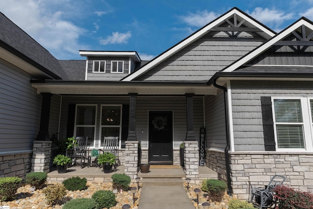 140 Holmes Dr, Spartanburg, SC 29303 - doorway to property featuring stone siding and covered porch