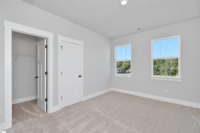 913 Wild Pine Ct, Duncan, SC 29334 - unfurnished bedroom with carpet flooring and a walk in closet