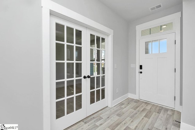 913 Wild Pine Ct, Duncan, SC 29334 - entrance foyer with french doors and light wood-type flooring