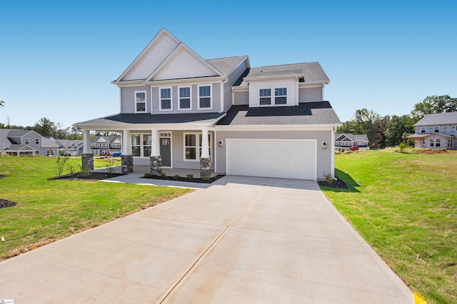 913 Wild Pine Ct, Duncan, SC 29334 - craftsman house featuring a porch, concrete driveway, a front yard, and a garage