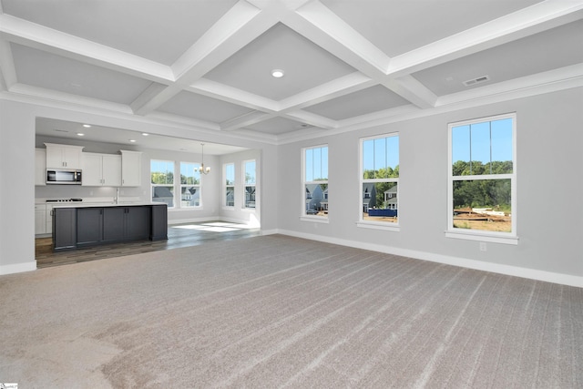 913 Wild Pine Ct, Duncan, SC 29334 - unfurnished living room with coffered ceiling, carpet floors, beam ceiling, recessed lighting, and a chandelier