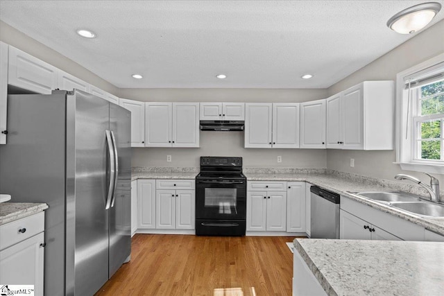 263 Cornelson Dr, Greer, SC 29651 - kitchen featuring appliances with stainless steel finishes, under cabinet range hood, light countertops, white cabinets, and recessed lighting