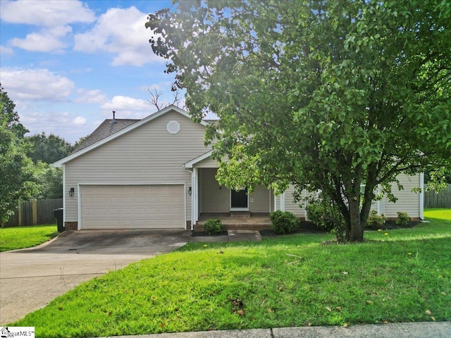 263 Cornelson Dr, Greer, SC 29651 - view of property hidden behind natural elements with a garage, concrete driveway, and covered porch
