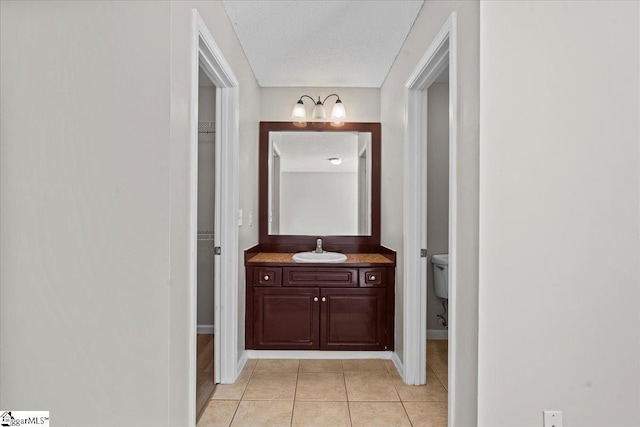 263 Cornelson Dr, Greer, SC 29651 - corridor featuring light tile patterned flooring, a chandelier, and a textured ceiling