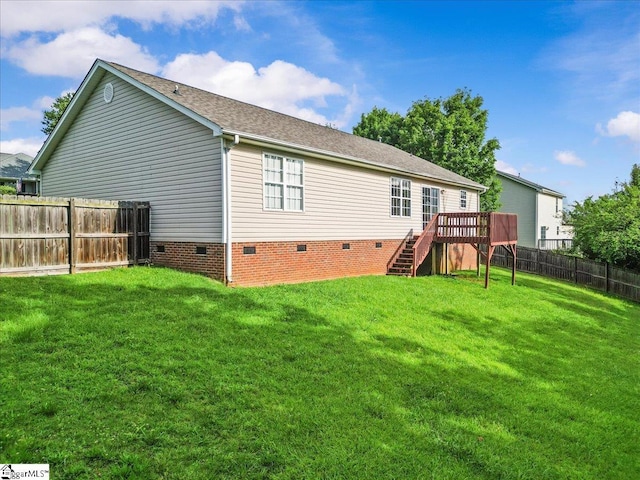 263 Cornelson Dr, Greer, SC 29651 - rear view of property featuring crawl space, stairway, a fenced backyard, a deck, and roof with shingles