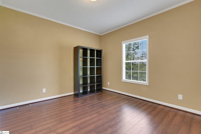 1893 Lake Cunningham Rd, Greer, SC 29651 - spare room featuring ornamental molding and wood finished floors