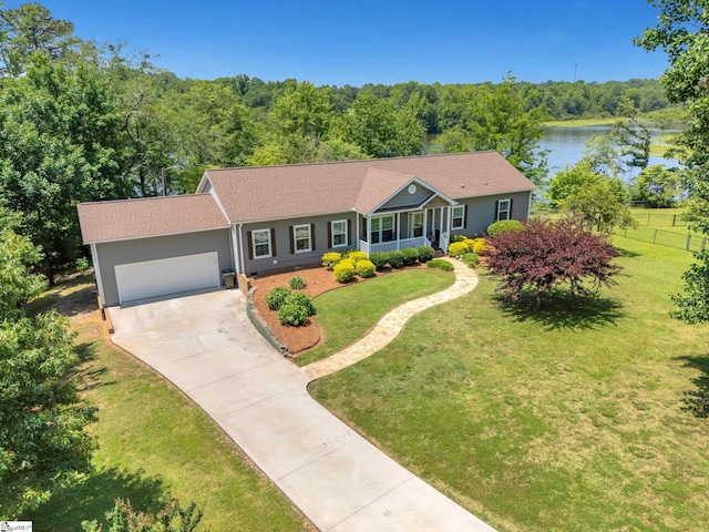 1893 Lake Cunningham Rd, Greer, SC 29651 - ranch-style house with concrete driveway, a garage, and a water view