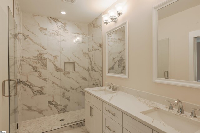 18003 Clermont Cir, Seneca, SC 29678 - bathroom featuring marble look tiles, a marble finish shower, double vanity, and recessed lighting