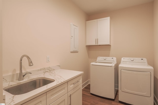18003 Clermont Cir, Seneca, SC 29678 - laundry area with washing machine and dryer, cabinet space, dark wood-style flooring, and electric panel