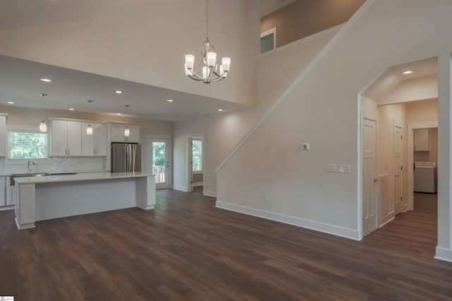 18003 Clermont Cir, Seneca, SC 29678 - kitchen with freestanding refrigerator, a center island, dark wood-style flooring, light countertops, and recessed lighting
