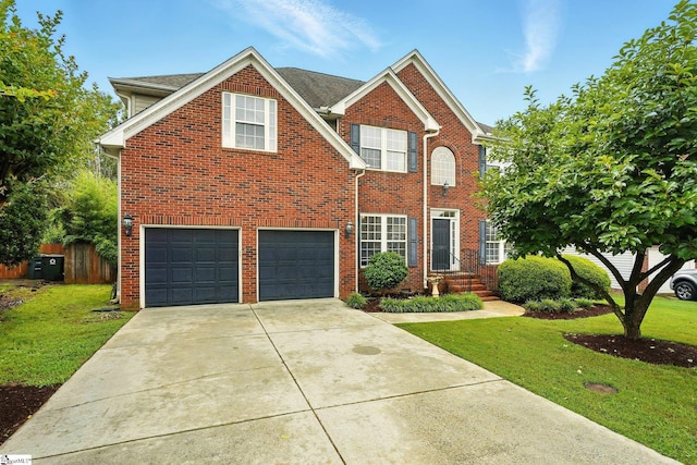 108 Myrtle Way, Greer, SC 29650 - view of front of house featuring a garage, brick siding, and driveway