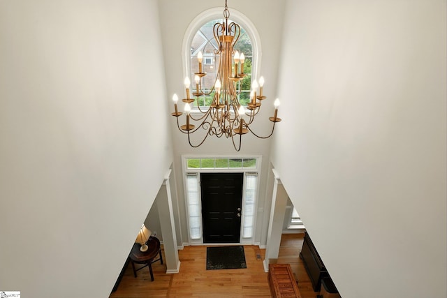 108 Myrtle Way, Greer, SC 29650 - foyer entrance featuring a chandelier, wood finished floors, and a towering ceiling