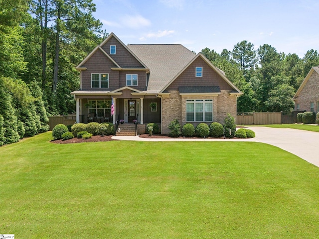 203 Piper Glen Ln, Inman, SC 29349 - craftsman-style home with concrete driveway, brick siding, and a porch